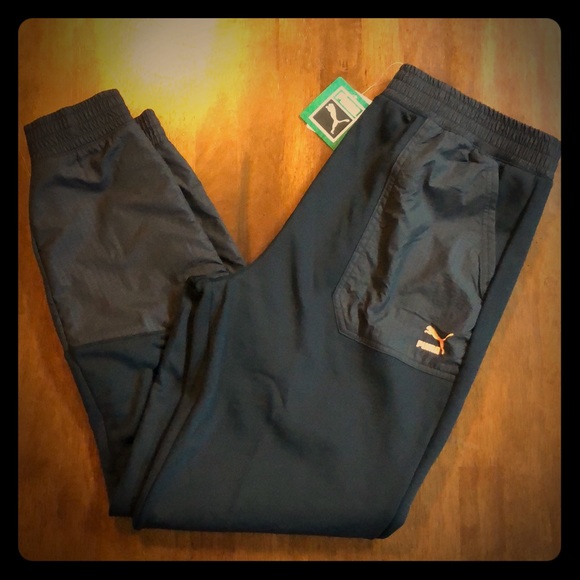 Puma Pants - NWOT Puma black multi fabric flex skinny joggers!